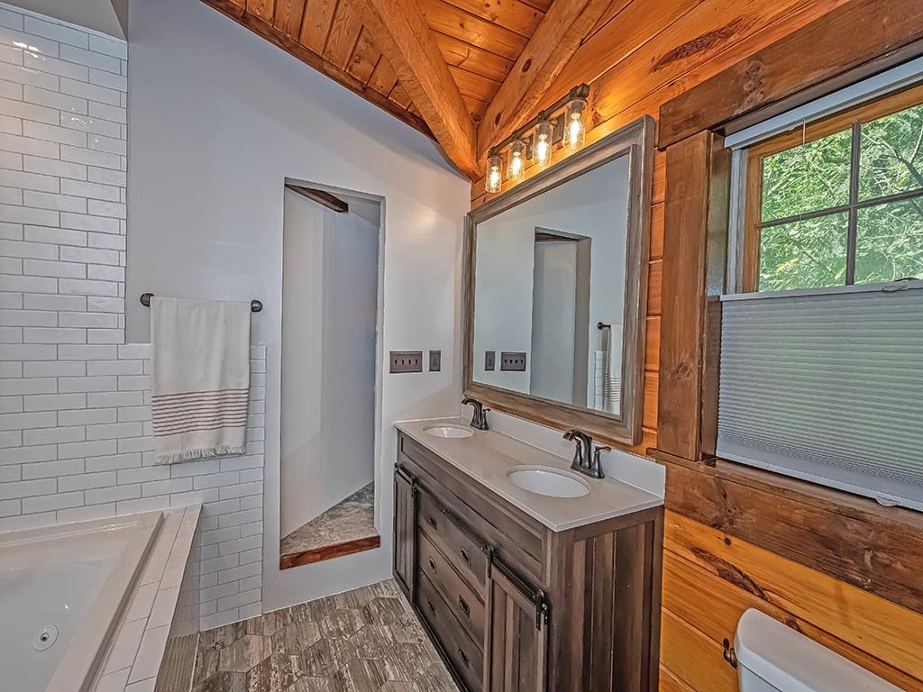 210 Edgewater Drive Monaca, PA 15061 - Photo 37 of 47 a bathroom with a sink a vanity and a mirror