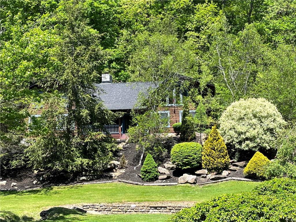 210 Edgewater Drive Monaca, PA 15061 - Photo 4 of 47 a view of a garden with a tree