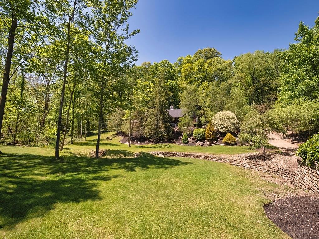 210 Edgewater Drive Monaca, PA 15061 - Photo 9 of 47 a backyard of a house with lots of green space and fountain