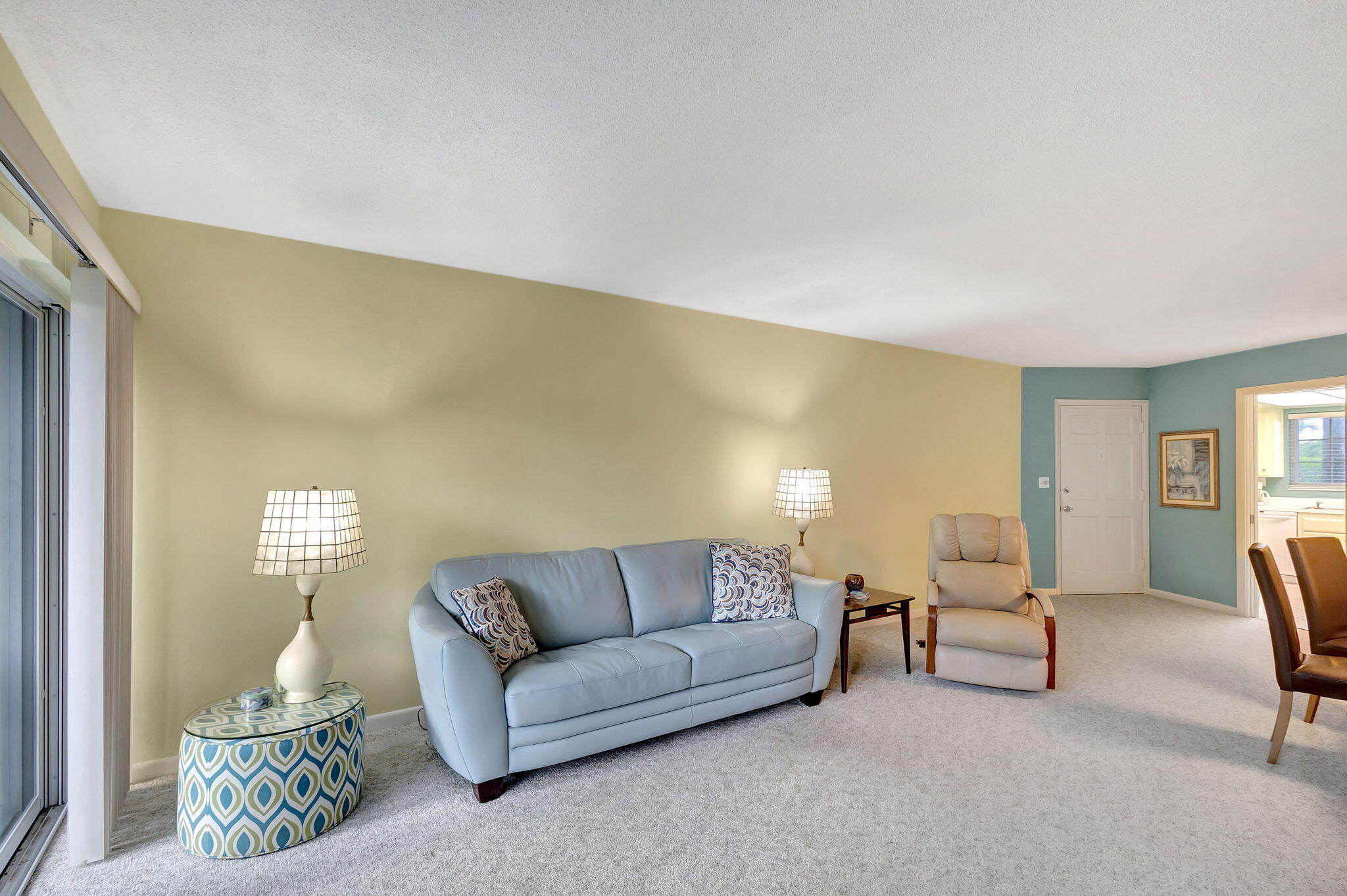 50 Celestial Way, Unit 108 Juno Beach, FL 33408 - Photo 14 of 54 a living room with furniture and a window