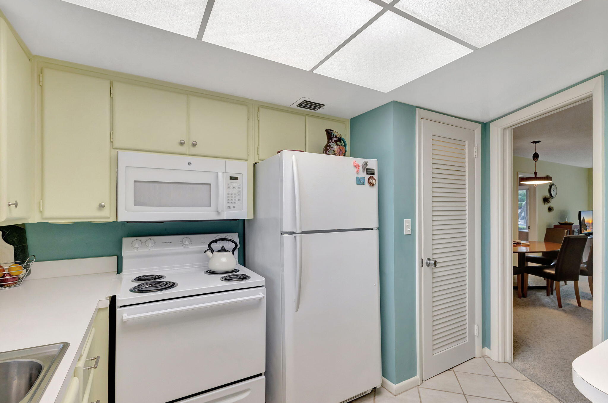 50 Celestial Way, Unit 108 Juno Beach, FL 33408 - Photo 19 of 54 a utility room with dryer and washer