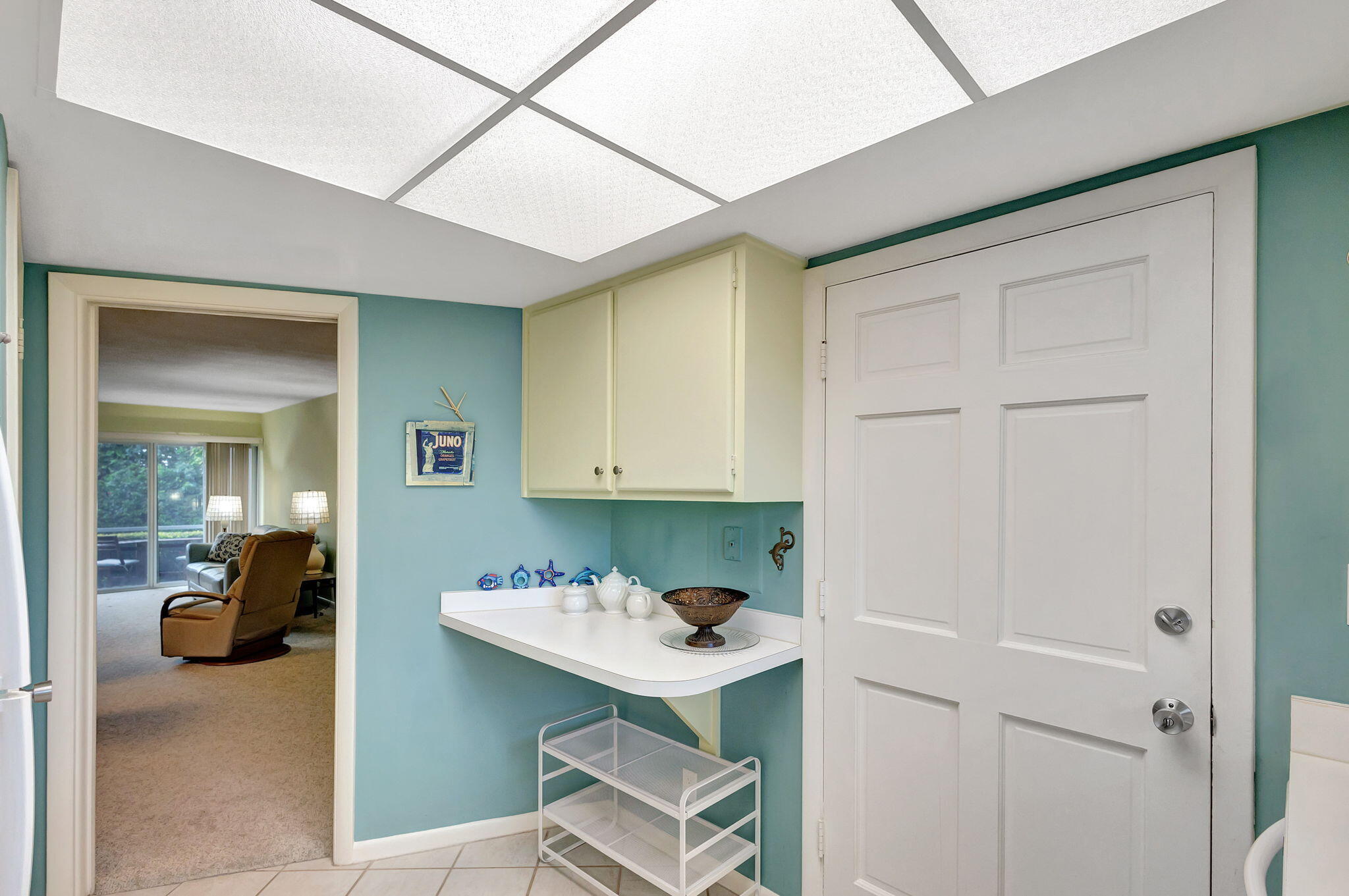 50 Celestial Way, Unit 108 Juno Beach, FL 33408 - Photo 20 of 54 a bathroom with a sink and a mirror