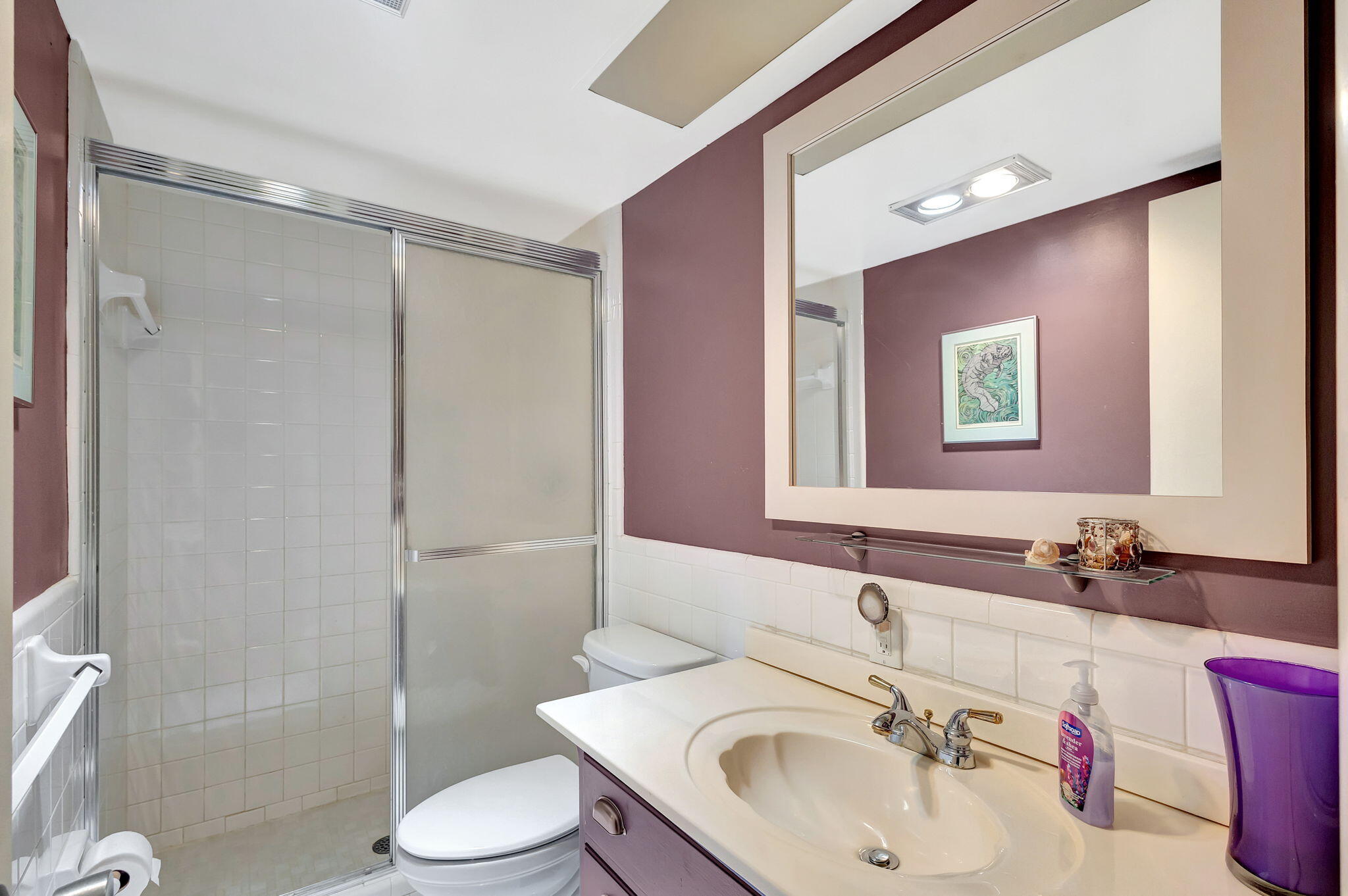 50 Celestial Way, Unit 108 Juno Beach, FL 33408 - Photo 29 of 54 a bathroom with a sink toilet and shower