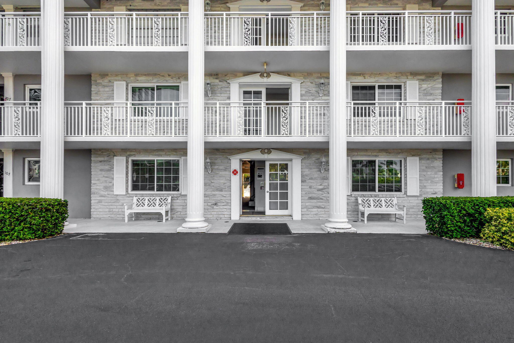 50 Celestial Way, Unit 108 Juno Beach, FL 33408 - Photo 43 of 54 a front view of a building with a garden