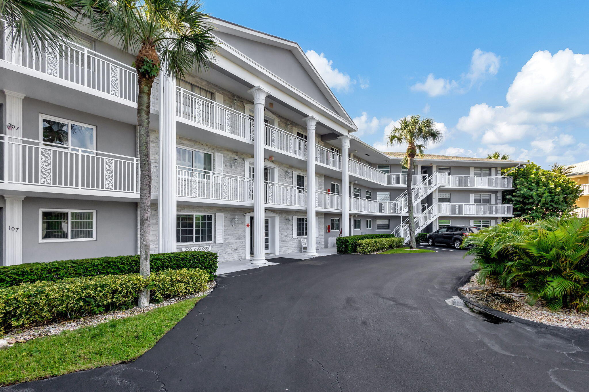 50 Celestial Way, Unit 108 Juno Beach, FL 33408 - Photo 45 of 54 a view of a building with a street