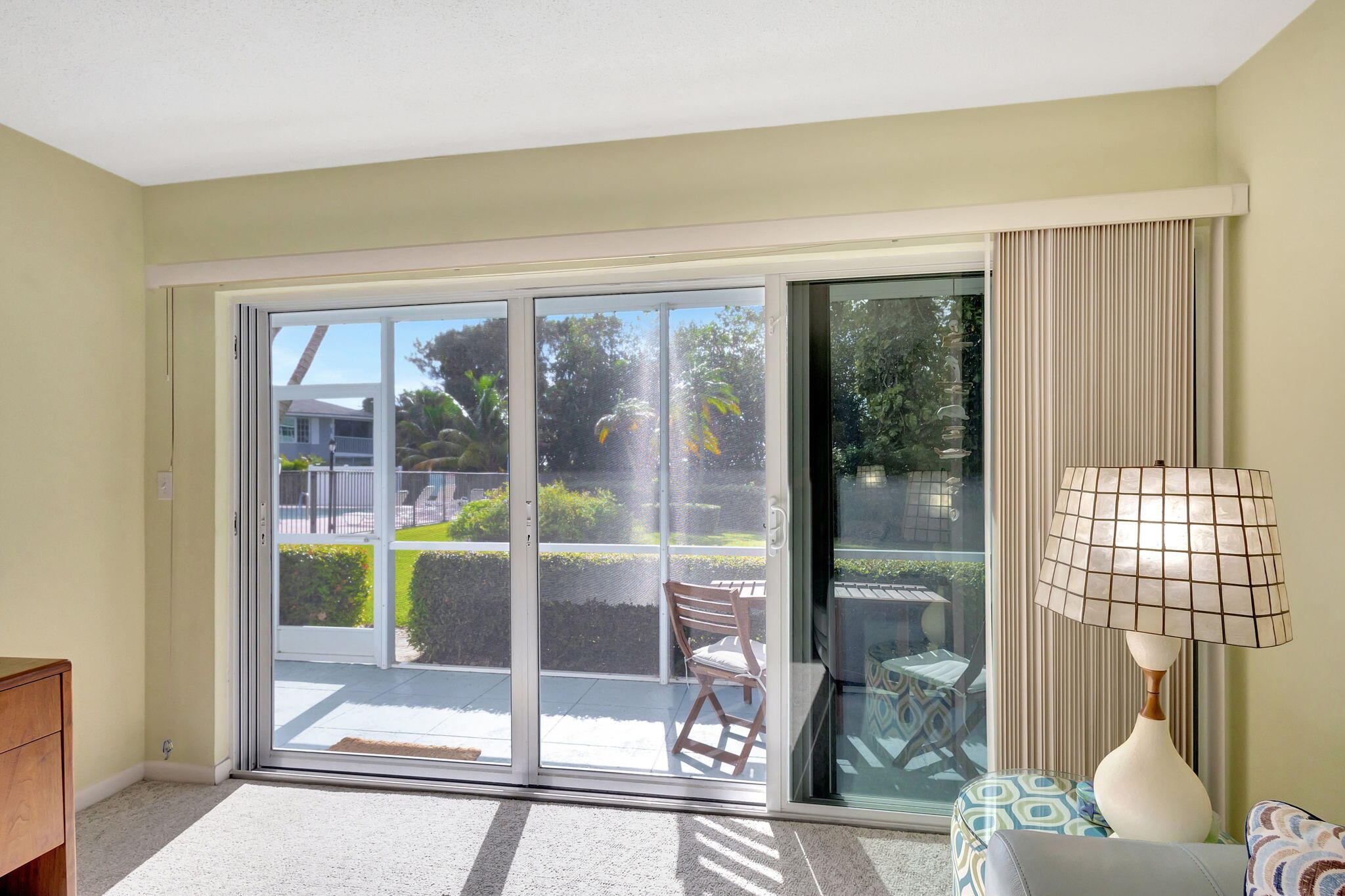 50 Celestial Way, Unit 108 Juno Beach, FL 33408 - Photo 6 of 54 a view of a room that has a large window