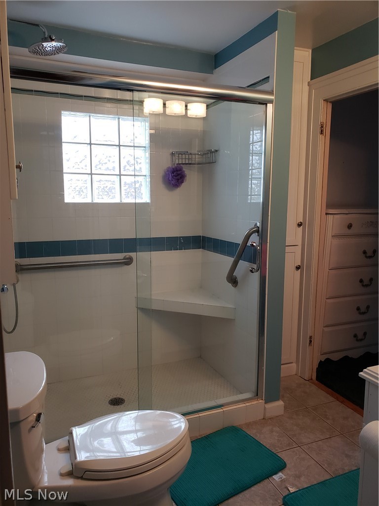 17444 Ravenna Road Chagrin Falls, OH 44023 - Photo 9 of 9 This bathroom with a handicapped equipped shower is off the main floor room used as an office. The bathroom was designed to enable an elderly parent to live on the main floor