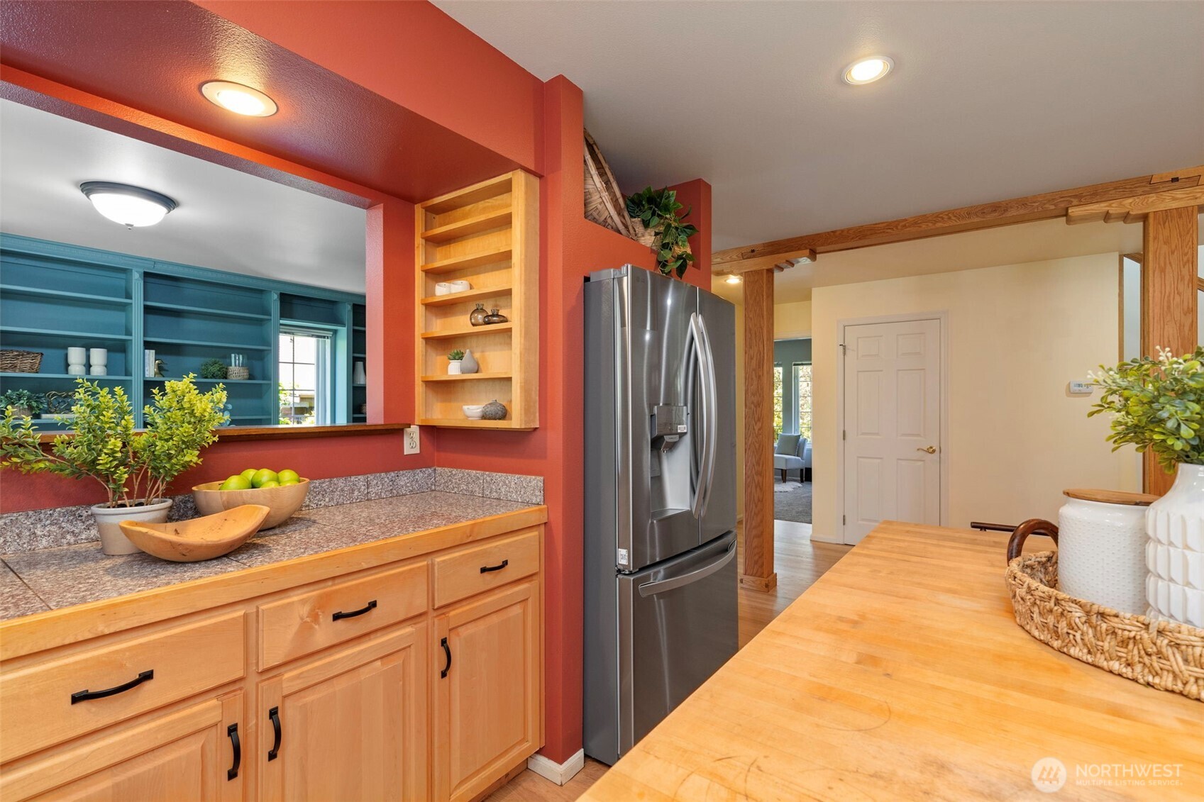 1757 Maple Street Port Townsend, WA 98368 - Photo 11 of 40 a spacious bathroom with a granite countertop sink and a large mirror