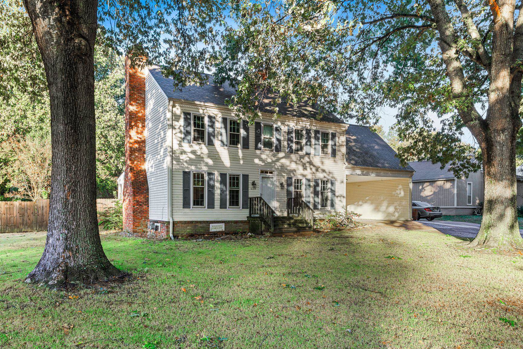429 Dove Valley Road Collierville, TN 38017 - Photo 1 of 24 a view of a house with a yard