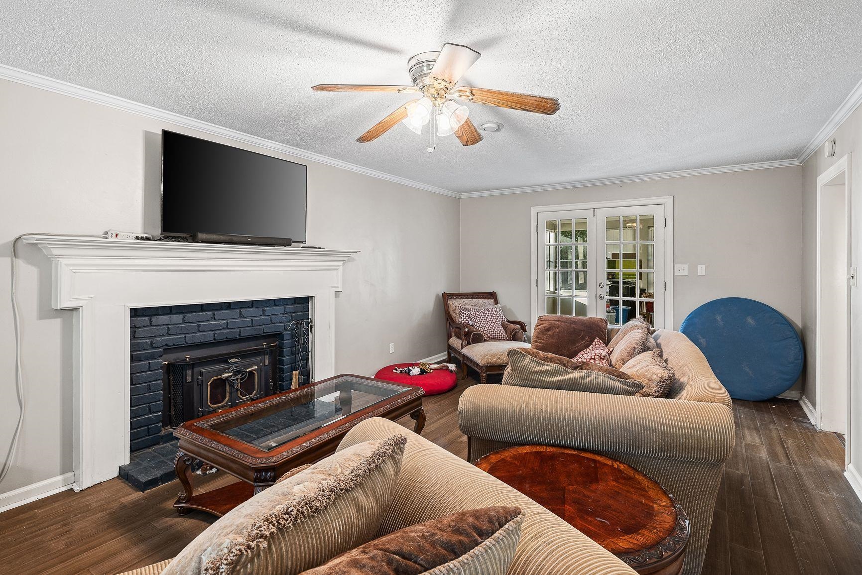 429 Dove Valley Road Collierville, TN 38017 - Photo 13 of 24 a living room with furniture and a fireplace