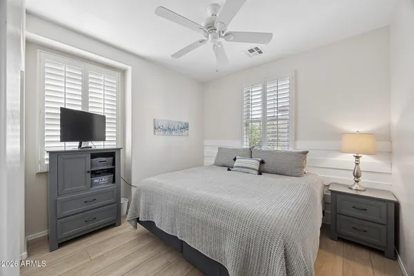 a kitchen with stainless steel appliances granite countertop a sink and dishwasher a stove with wooden floors