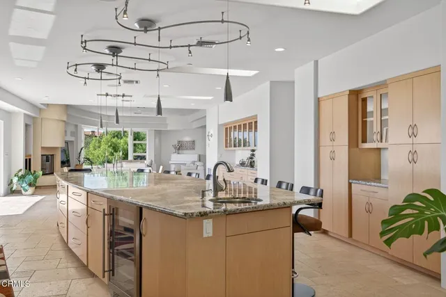 a view of house with outdoor space and garden