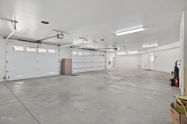 a view of swimming pool with outdoor seating and a potted plant