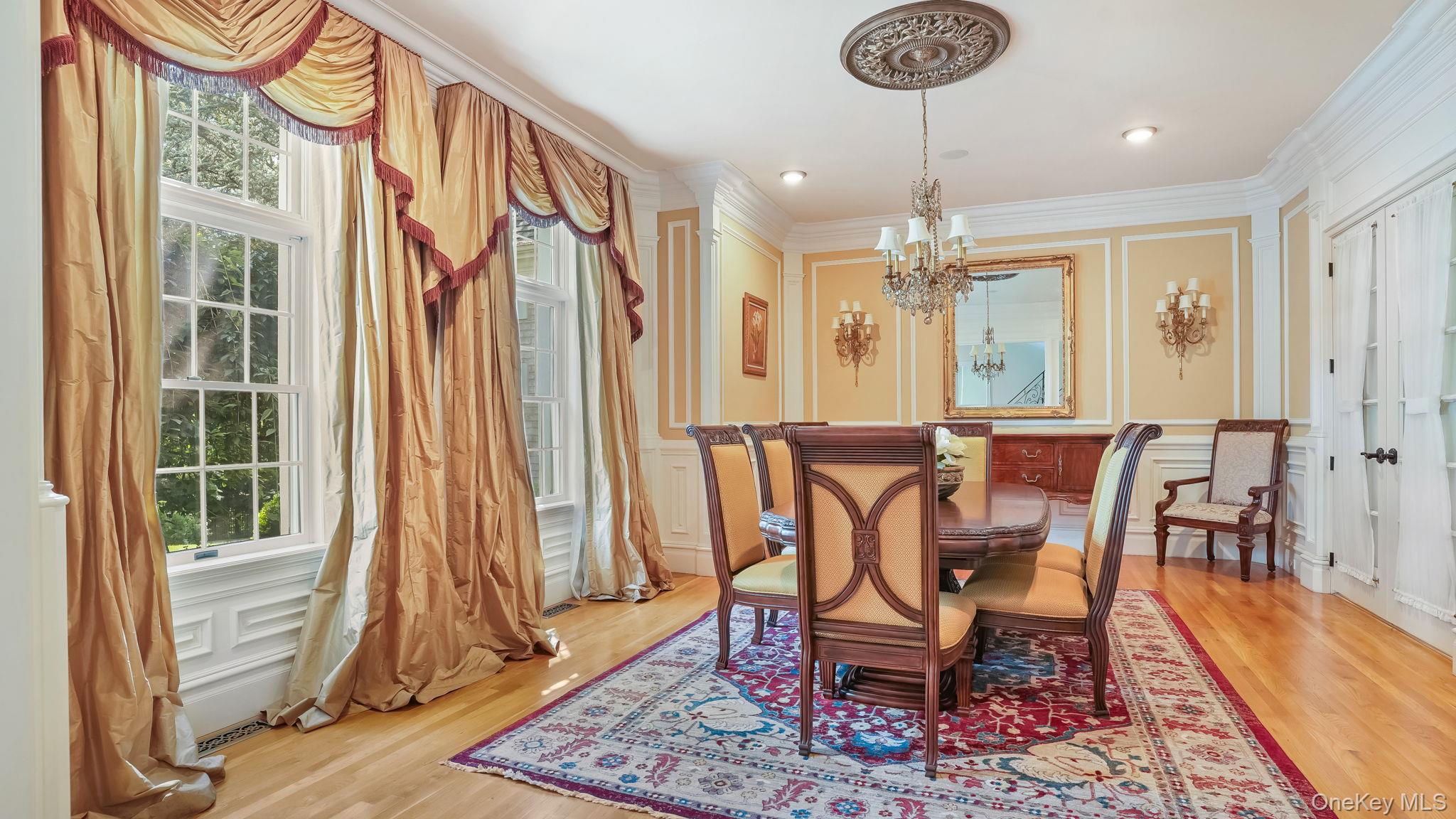 4 Hageman Court Katonah, NY 10536 - Photo 15 of 47 a view of a dining room with furniture window and wooden floor