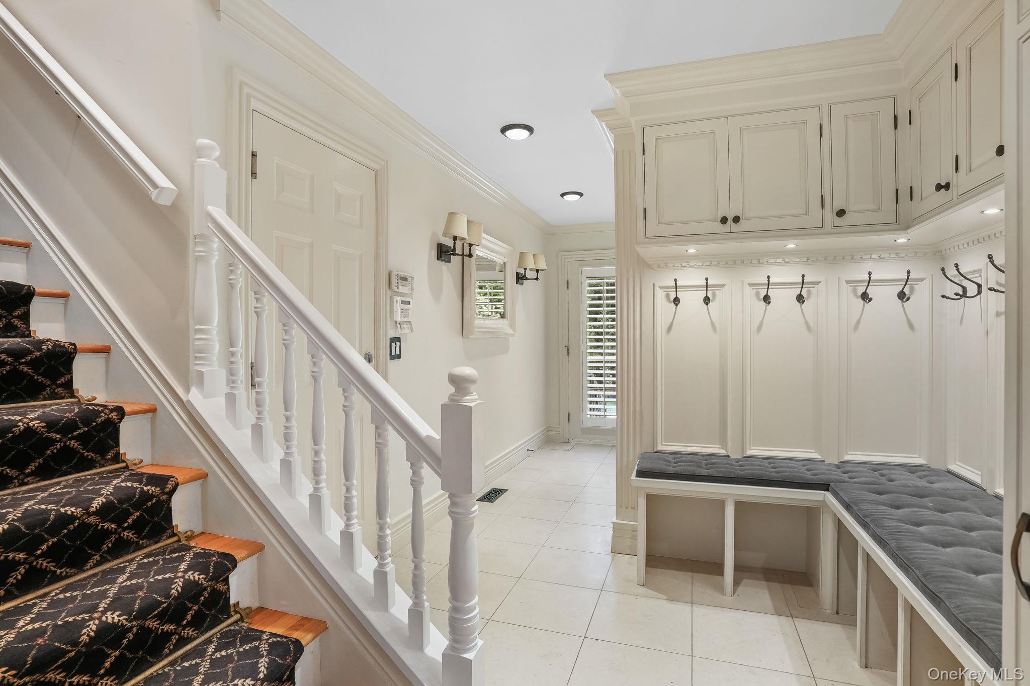 4 Hageman Court Katonah, NY 10536 - Photo 17 of 47 a view of an entryway with wooden floor