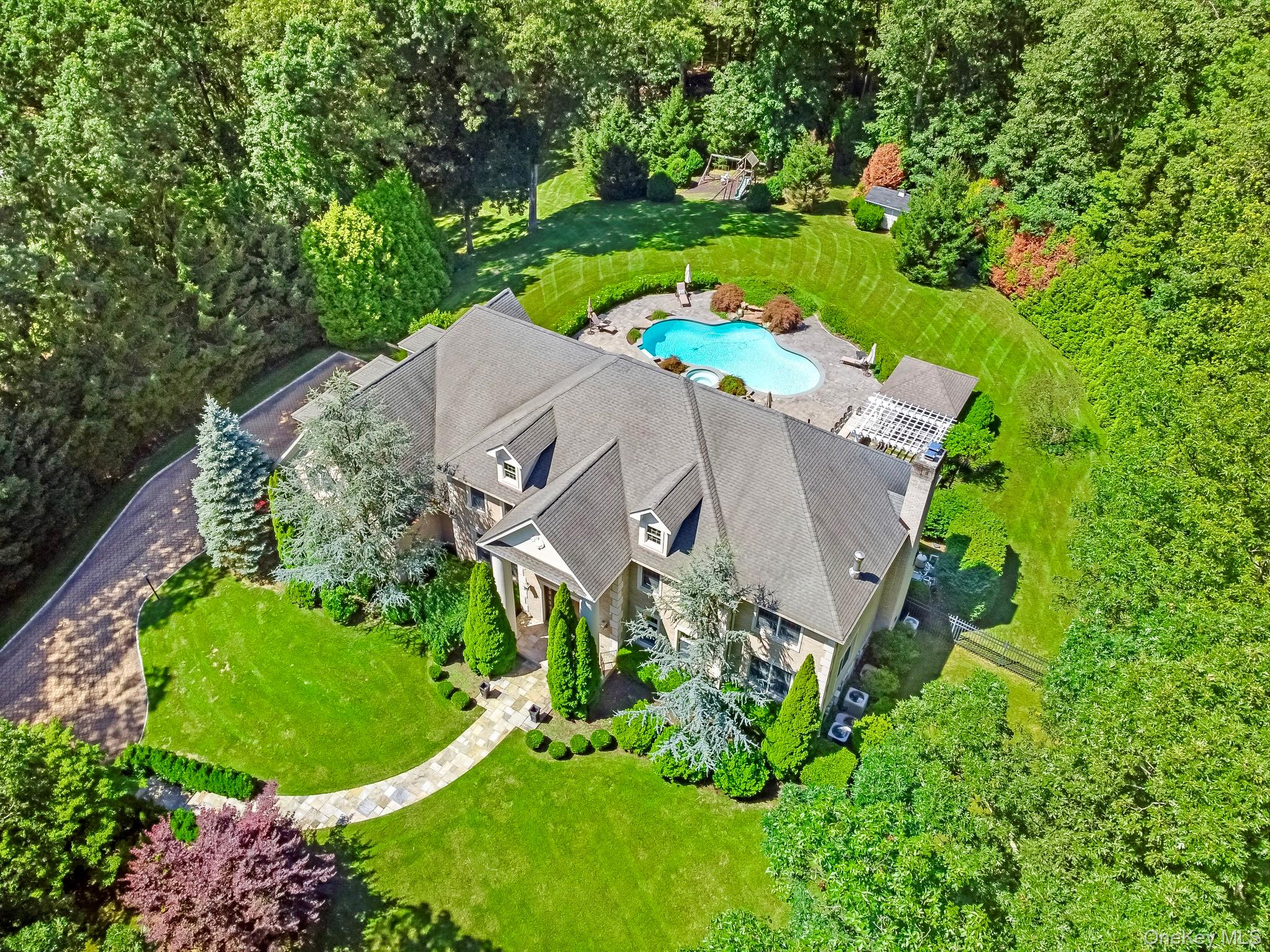 4 Hageman Court Katonah, NY 10536 - Photo 2 of 47 an aerial view of a house