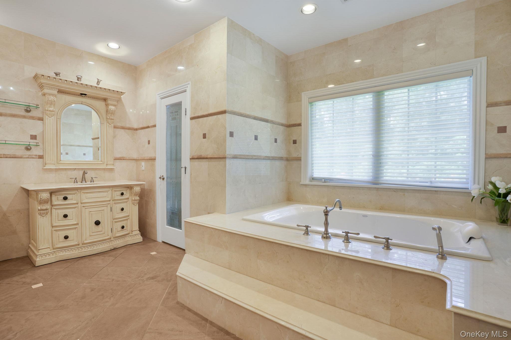 4 Hageman Court Katonah, NY 10536 - Photo 23 of 47 a spacious bathroom with a double vanity sink mirror and double