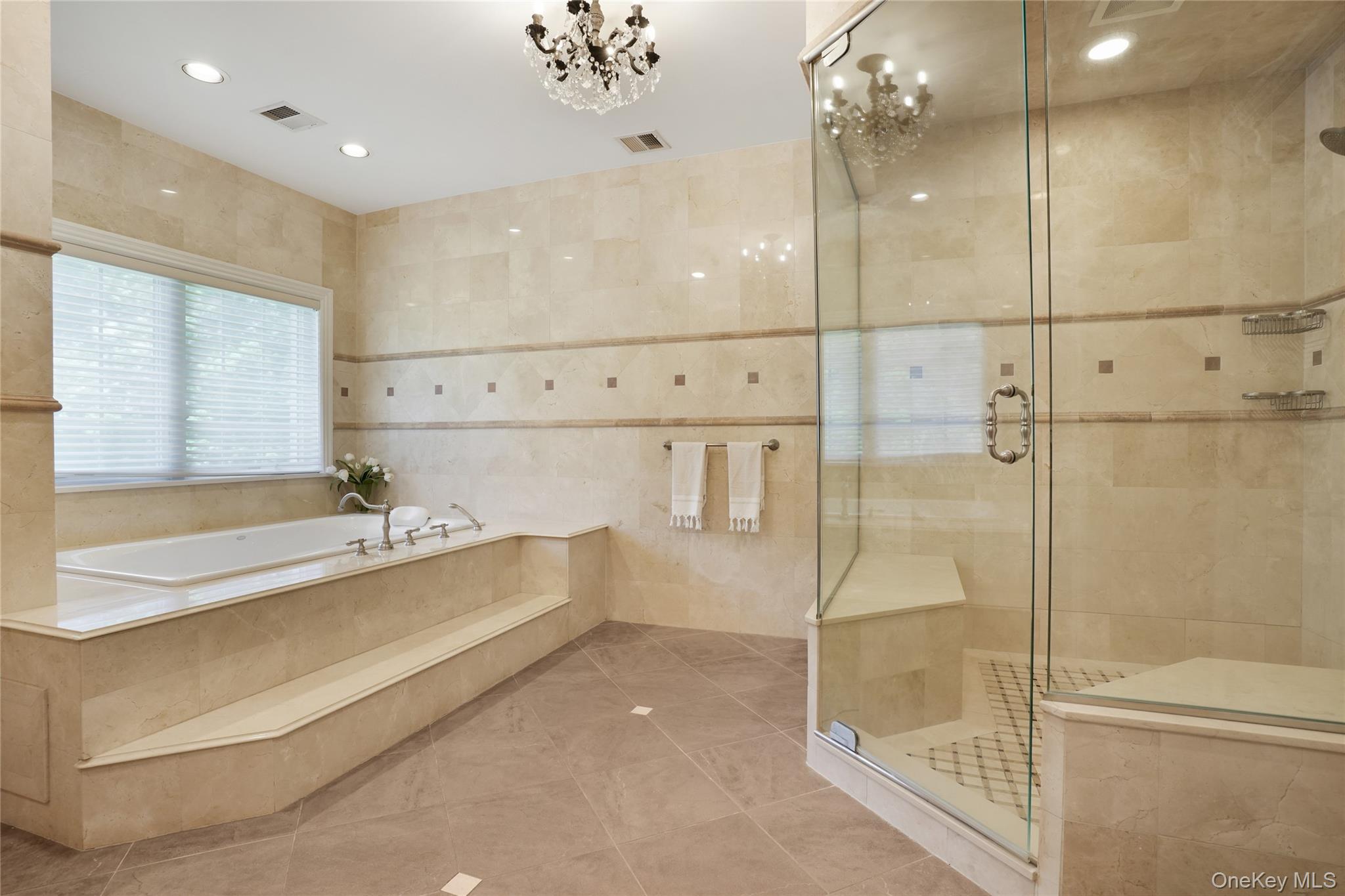 4 Hageman Court Katonah, NY 10536 - Photo 24 of 47 a bathroom with a bathtub and a shower