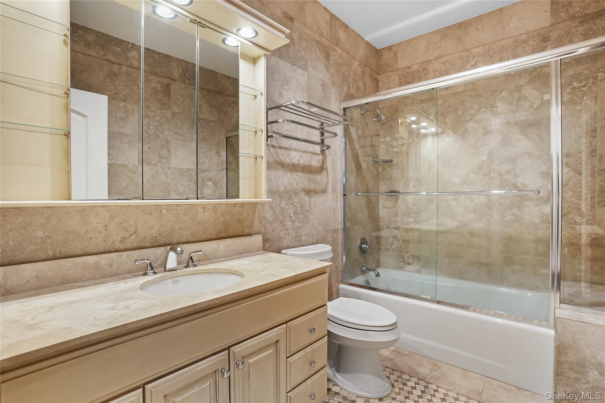 4 Hageman Court Katonah, NY 10536 - Photo 28 of 47 a bathroom with a sink a toilet and shower