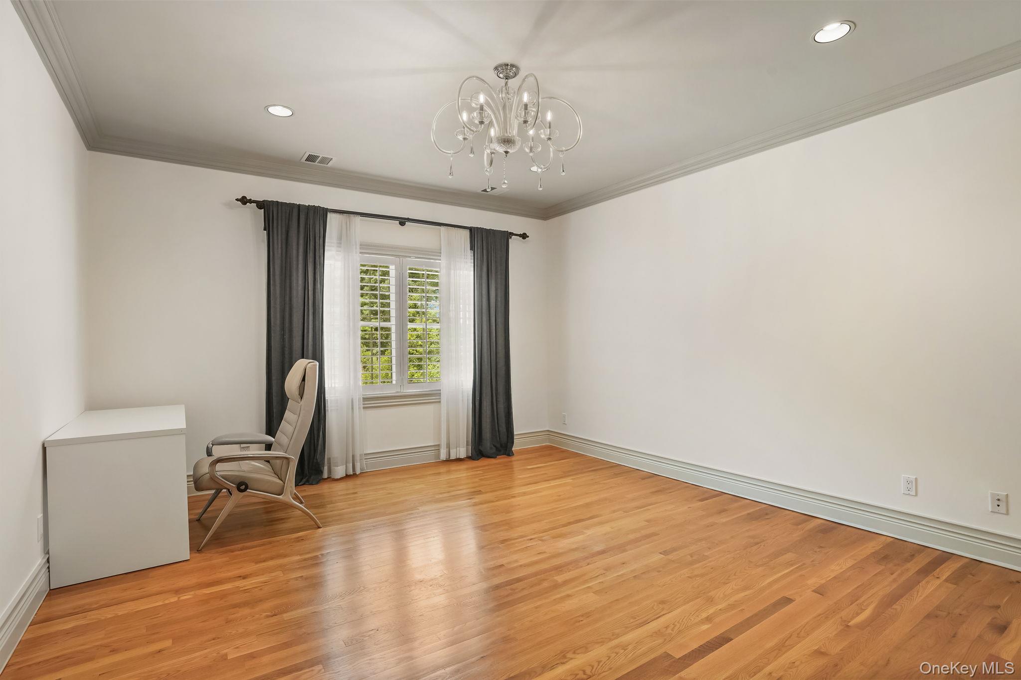 4 Hageman Court Katonah, NY 10536 - Photo 31 of 47 a view of a livingroom with a furniture and wooden floor