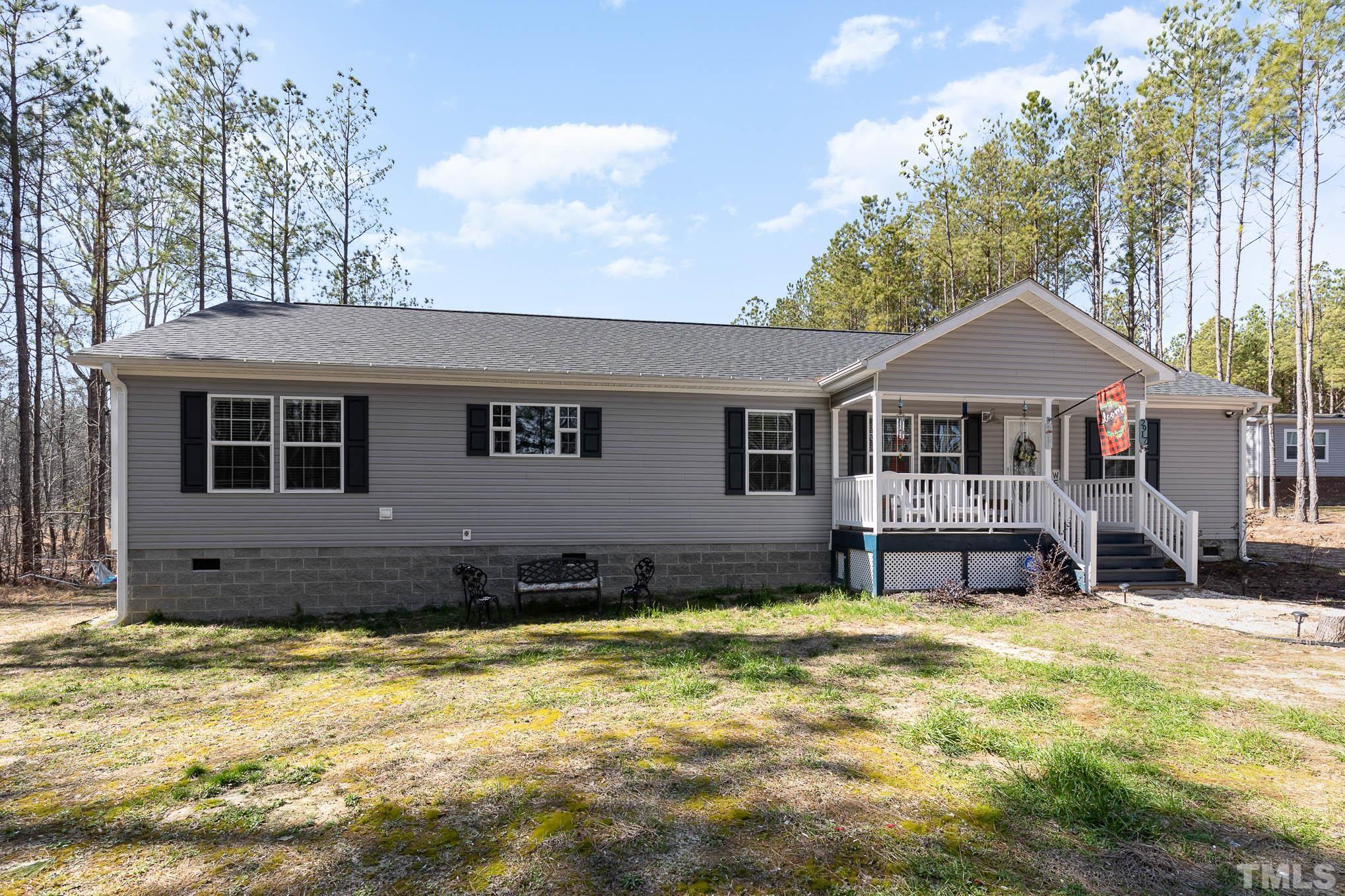 2917 Edgemont Road Wendell, NC 27591 - Photo 3 of 27 a front view of a house with a yard