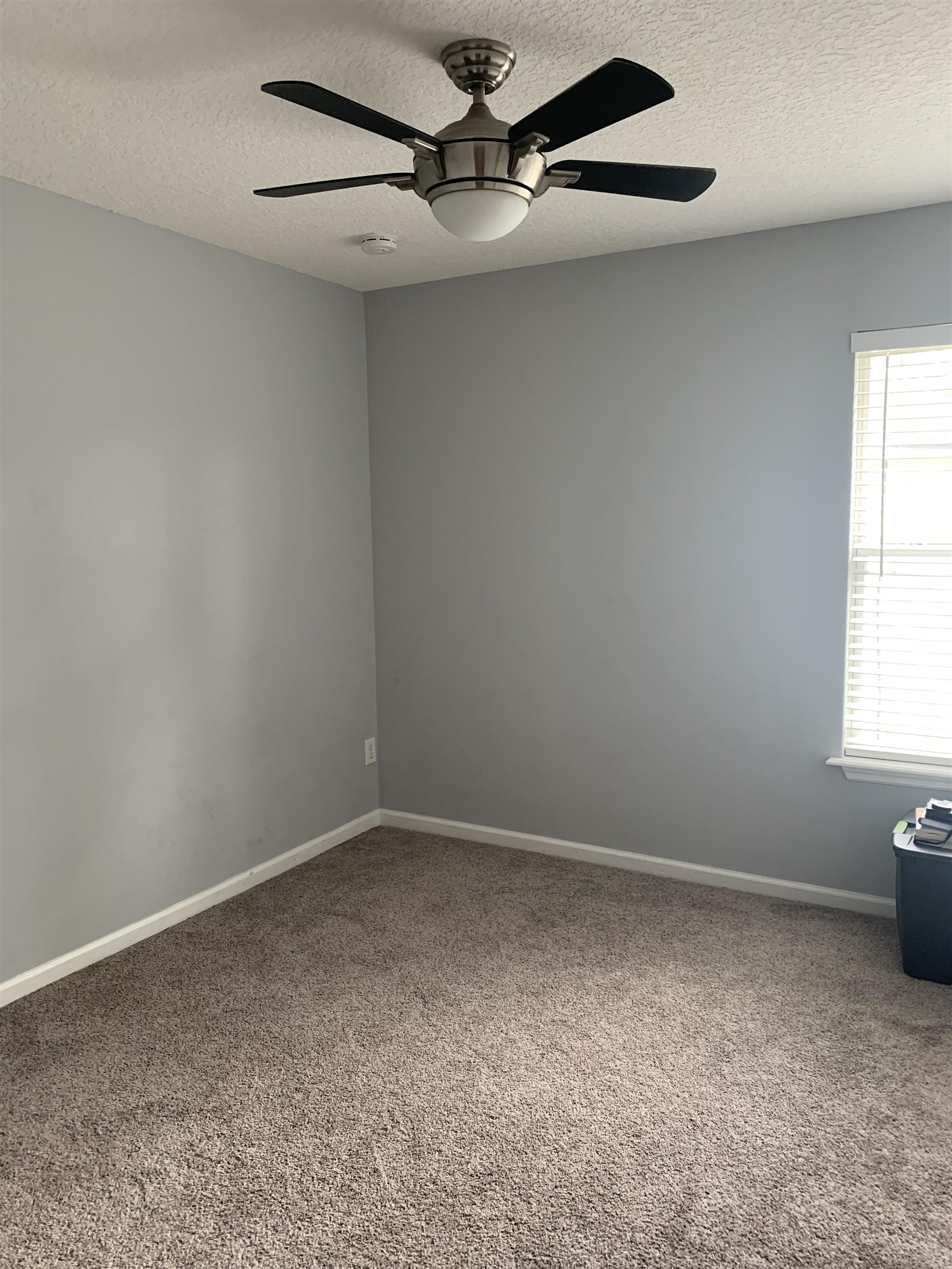 619 South Tree Garden Drive St. Augustine, FL 32086 - Photo 16 of 21 an empty room with a window and a fan
