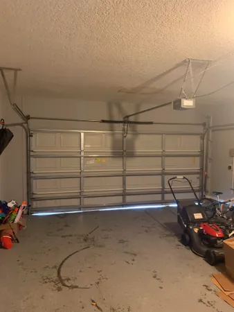 a view of a garage with storage