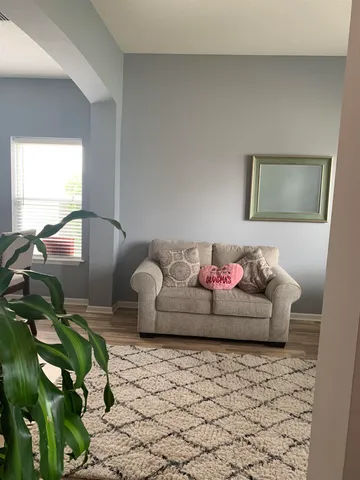 a living room with furniture