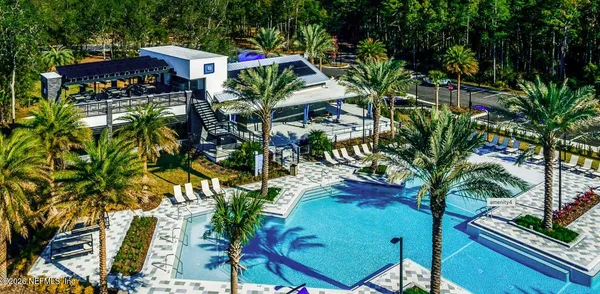 a view of swimming pool from a balcony
