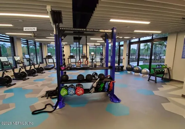 a gym room with gym equipment