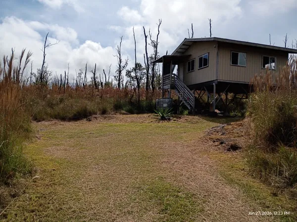 a house view with a outdoor space