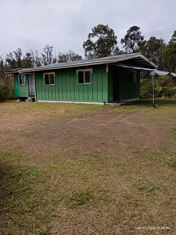 a view of a house with a balcony