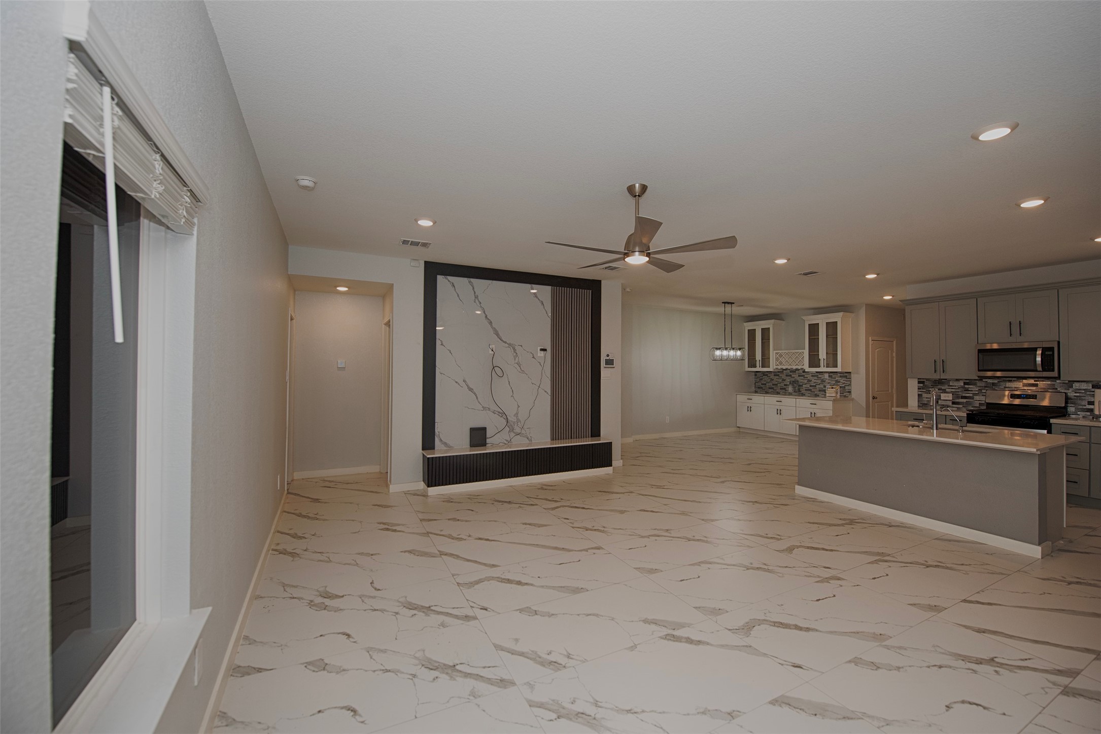 15223 Mayflower Street New Caney, TX 77357 - Photo 42 of 42 a view of a kitchen with a sink and cabinets
