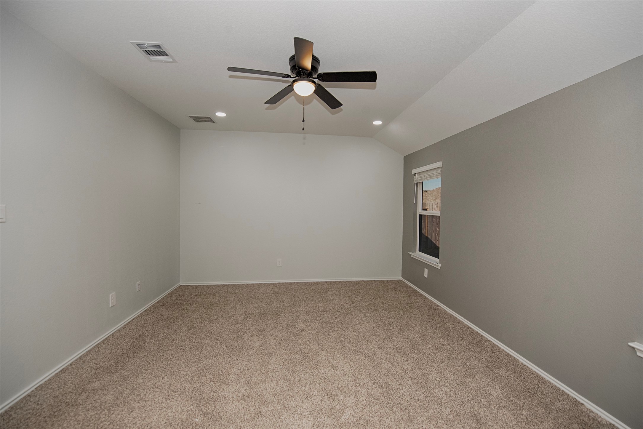 15223 Mayflower Street New Caney, TX 77357 - Photo 20 of 42 wooden floor in an empty room with a window