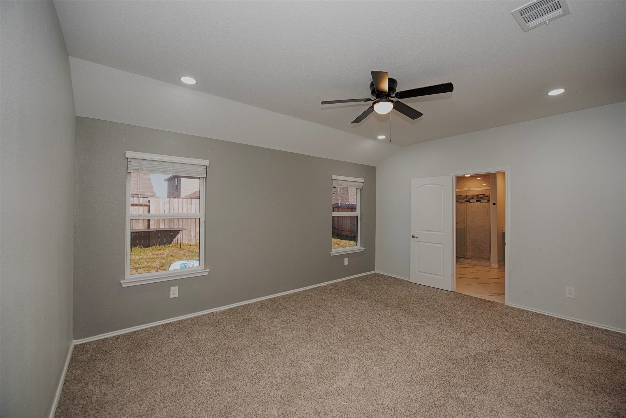 15223 Mayflower Street New Caney, TX 77357 - Photo 21 of 42 a view of an empty room with a window