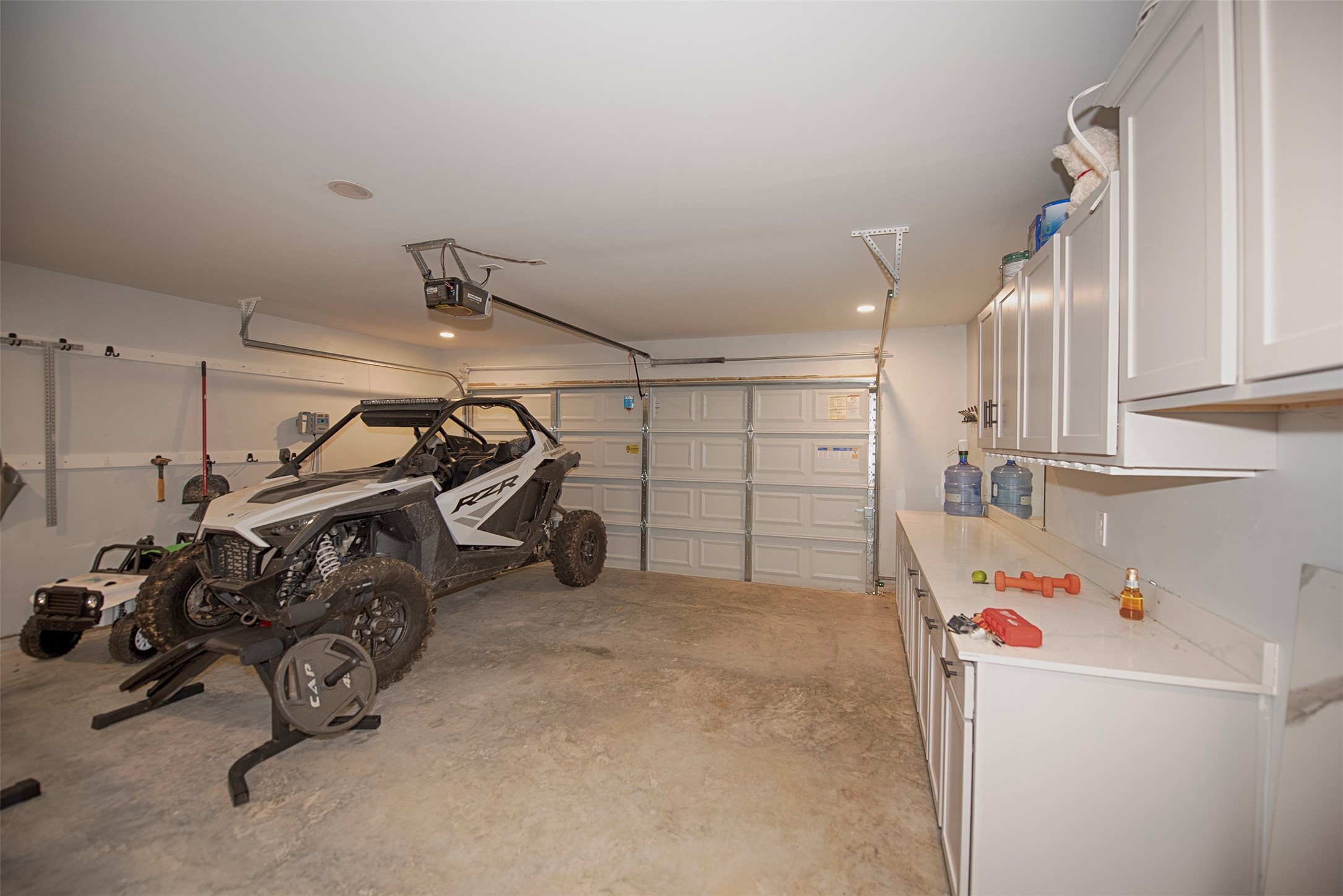 15223 Mayflower Street New Caney, TX 77357 - Photo 35 of 42 a view of a room with gym equipment
