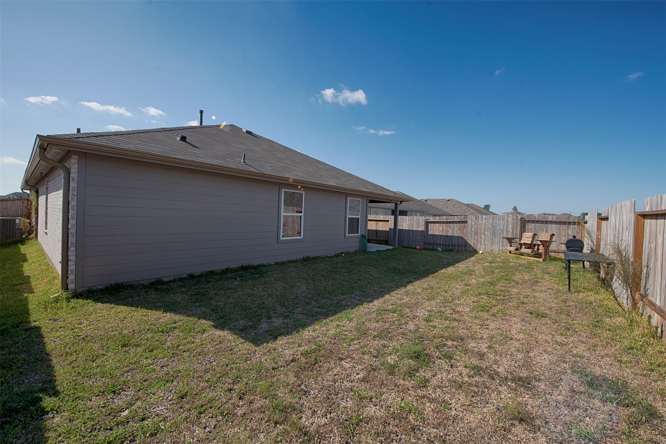 15223 Mayflower Street New Caney, TX 77357 - Photo 41 of 42 a view of a backyard