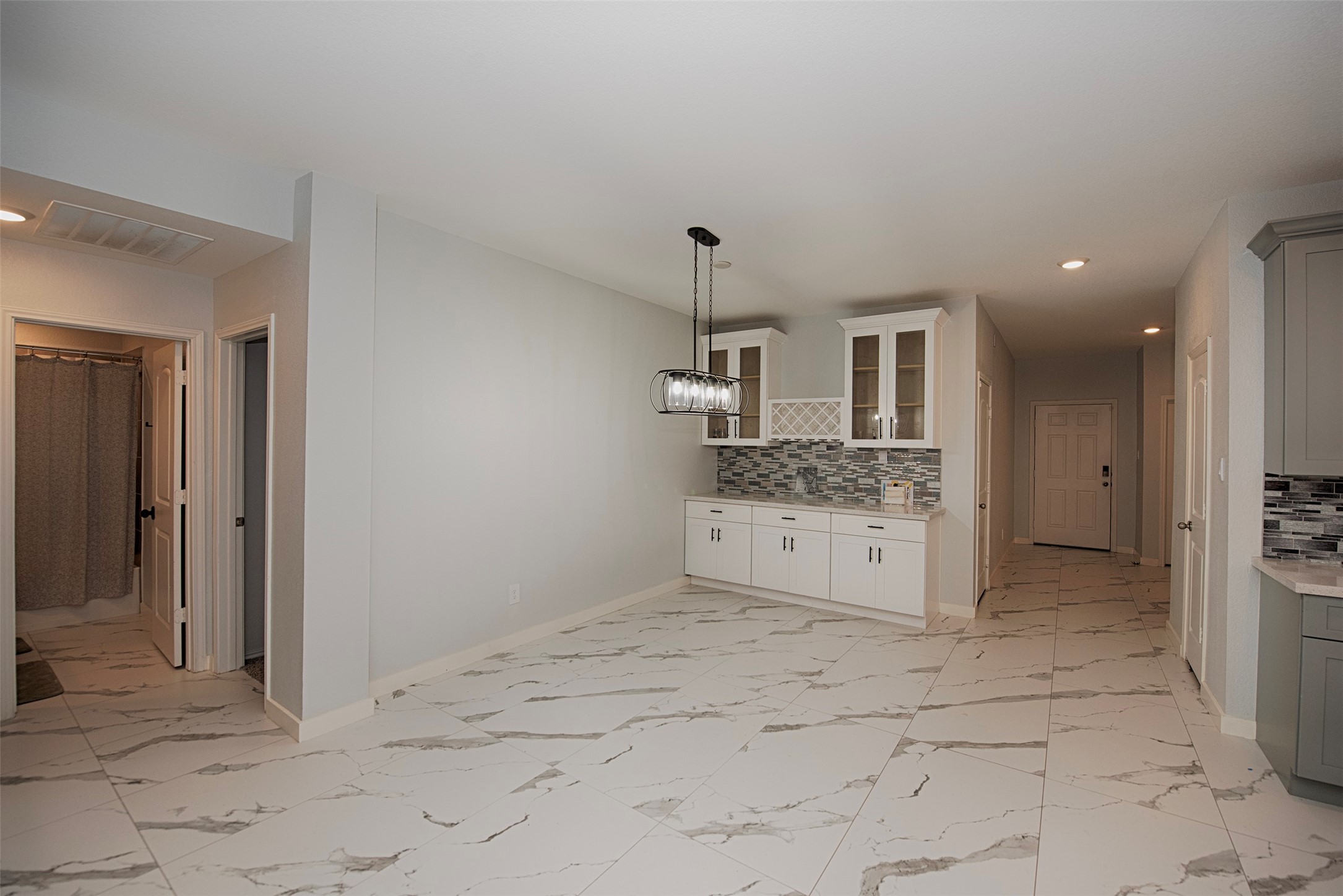 15223 Mayflower Street New Caney, TX 77357 - Photo 9 of 42 a bathroom with a sink and a mirror