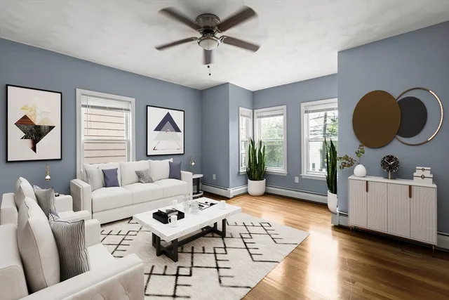 a living room with furniture and window