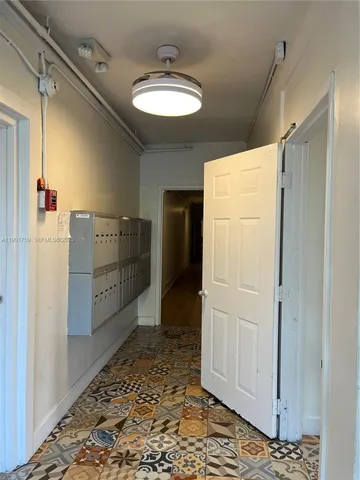 a bathroom with a shower and a sink