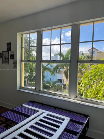 a view of a living room and a window