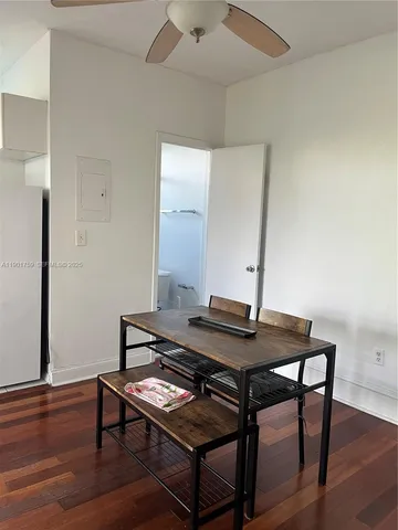 a room with furniture and wooden floor