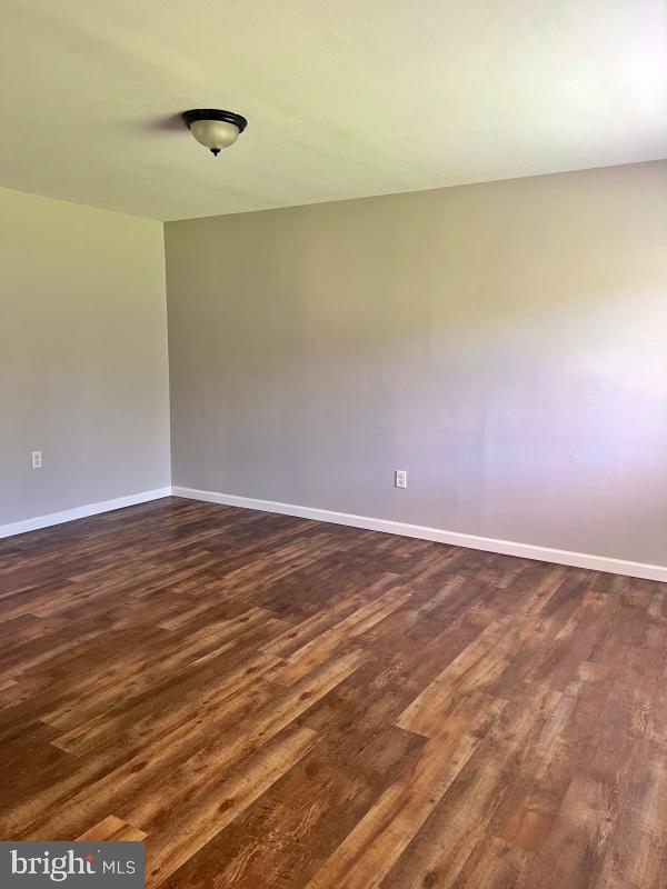 27 East Main Street, Unit D Windsor, PA 17366 - Photo 3 of 7 a view of an empty room with wooden floor and a window