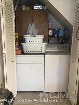 80 Greenwood Loop Road, Unit 80 Brick, NJ 08724 - Photo 12 of 38 a utility room with dryer and washer