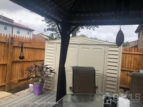 80 Greenwood Loop Road, Unit 80 Brick, NJ 08724 - Photo 18 of 38 a view of a porch with a chair