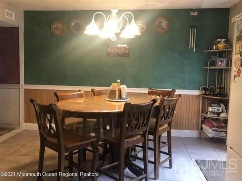 80 Greenwood Loop Road, Unit 80 Brick, NJ 08724 - Photo 7 of 38 a view of a dining room with furniture