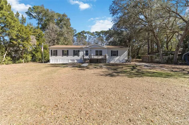 a view of a house with a patio
