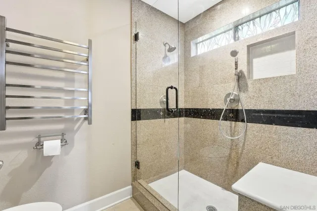 a bathroom with a sink and a shower