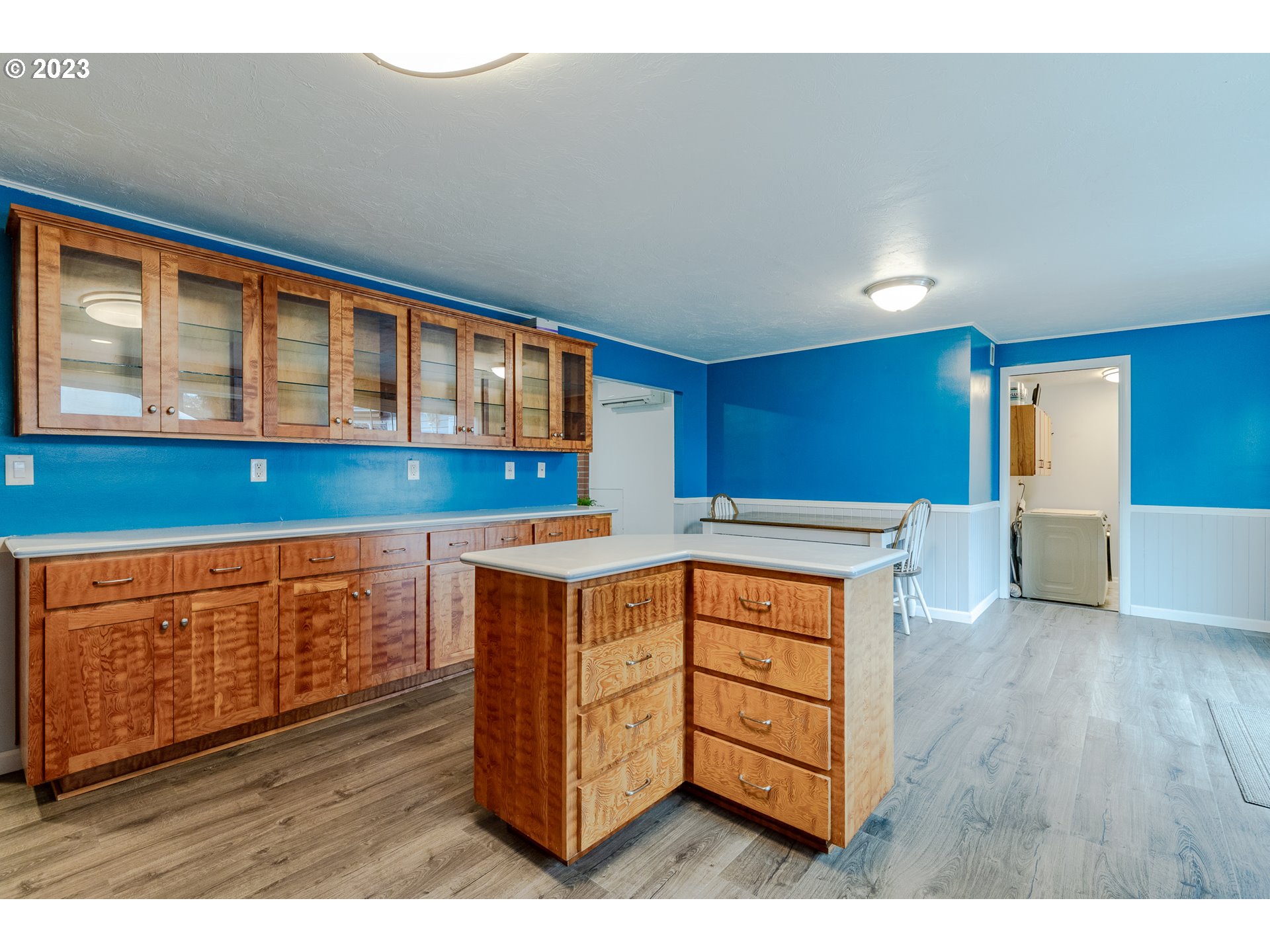 4067 North Street Springfield, OR 97478 - Photo 8 of 30 a kitchen with stainless steel appliances granite countertop a stove and a wooden floors