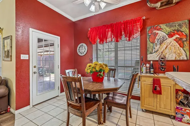 a view of a room with furniture and chandelier